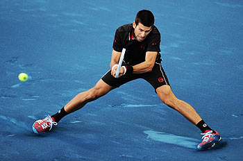 Serbia's Novak Djokovic plays a double handed backhand return against Spain's Daniel Gimeno-Traver during their second round match at the Madrid Open on Tuesday