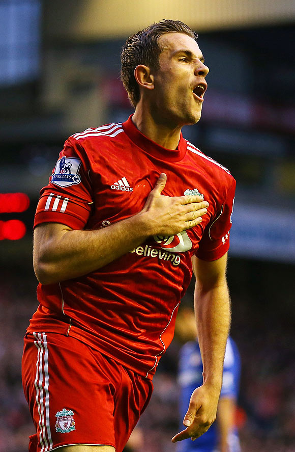 Liverpool's Jordan Henderson celebrates after scoring the second goal against Chelsea at Anfield on Tuesday