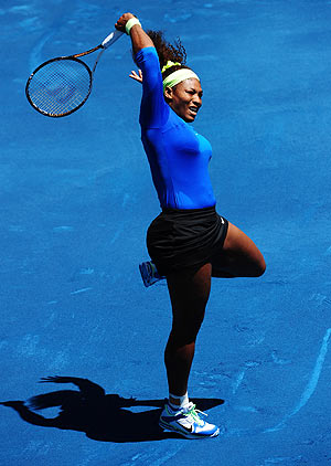 Serena Williams returns to Caroline Wozniacki during their match at the Madrid Open on Thursday