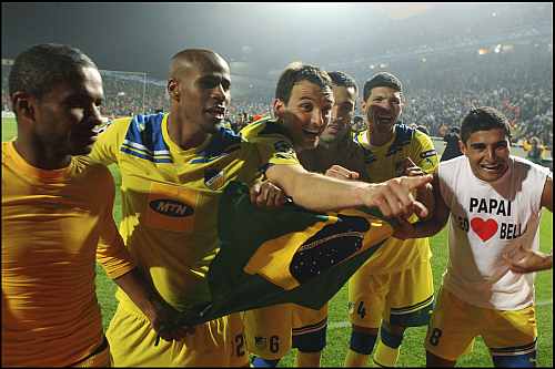 APOEL Nicosia players celebrate after winning a match
