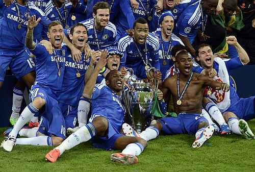 Chelsea's players celebrate with the trophy after their Champions League final match against Bayern Munich at the Allianz Arena in Munich