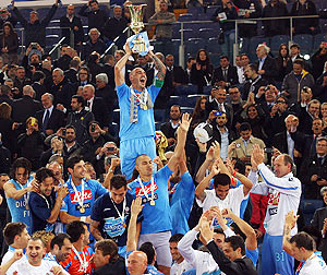Paolo Cannavaro captain of Napoli holds the trophy