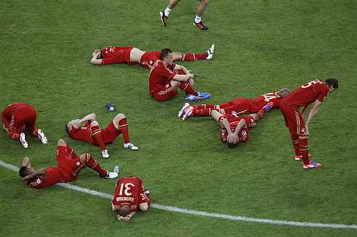 Players of Bayern Munich react after losing their Champions League final soccer match against Chelsea at the Allianz Arena in Munich