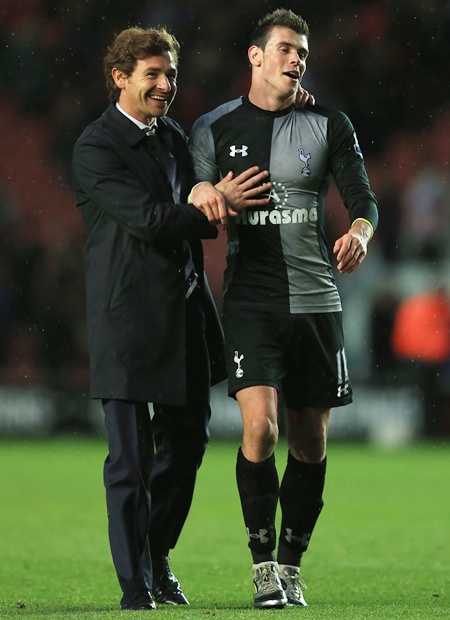 Manager Andre Villas Boas of Tottenham hugs Gareth Bale