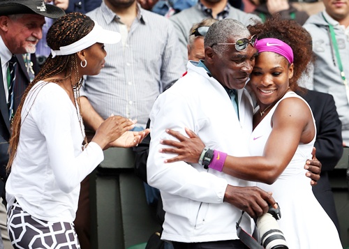 Serena Williams (right) of the USA with her father Richard Williams and sister Venus Williams