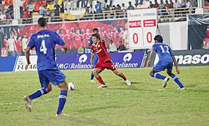 Pune FC's Daisuke Nishiguchi in action during their match against Churchill Brothers on Sunday