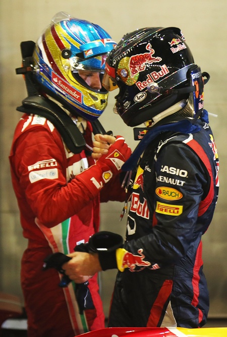 Fernando Alonso with Sebastian Vettel