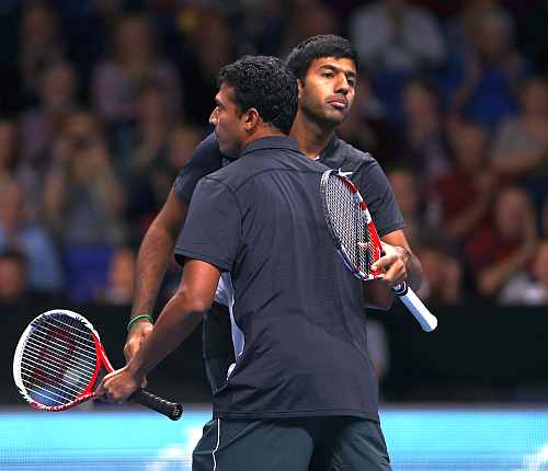 Rohan Bopanna of India and Mahesh Bhupathi of India celebrate their victory during the men's doubles match against Robert Lindstedt of Sweden and Horia Tecau of Romania