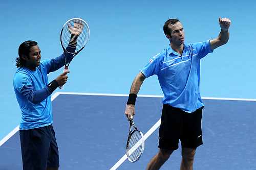 Radek Stepanek (R) of Czech Republic and Leander Paes of India celebrate their victory