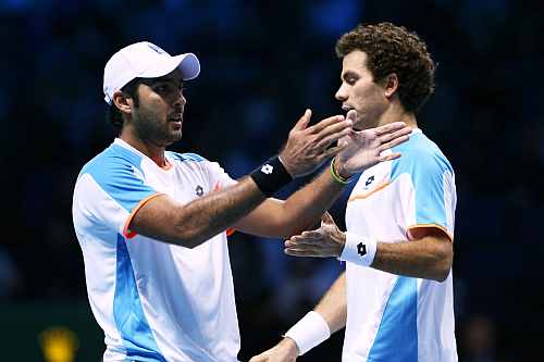 Aisam-Ul-Haq Qureshi of Pakistan and Jean-Julien Rojer of Netherlands react during the men's doubles match