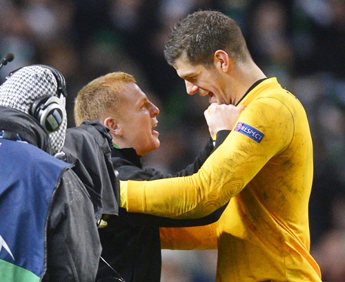 Celtic's manager Neil Lennon celebrates at the final whistle with Fraser Forster
