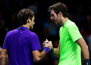 Juan Martin Del Potro shakes hands at the net with Roger Federer