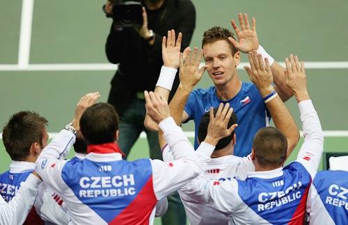 Tomas Berdych of Czech Republic is congratulated by his team mates