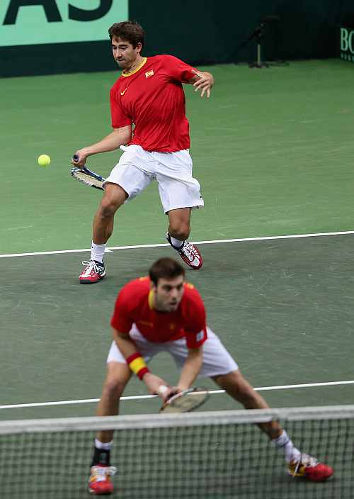 Marc Lopez and Marcel Granollers of Spain in action during their doubles match against Radek Stepanek and Tomas Berdych of Czech Republic