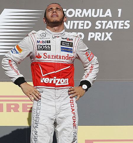 Lewis Hamilton on the podium after winning the US Grand Prix
