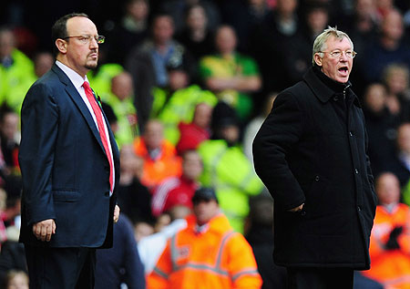 Manchester United Manager Alex Ferguson and Rafael Benitez at the touch line