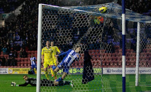 Jordi Gomez of Wigan scores his first goal during the Barclays Premier League match between Wigan Athletic and Reading