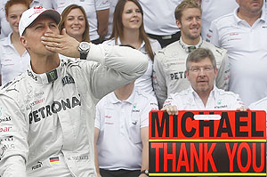 Mercedes Formula One driver Michael Schumacher gestures during a photo call before the Brazilian F1 Grand Prix  on Sunday