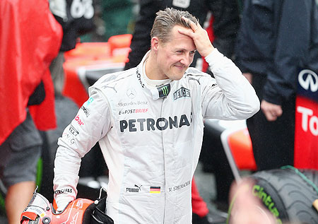 Michael Schumacher of Mercedes GP reacts in parc ferme after finishing his last F1 race following the Brazilian Formula One Grand Prix on Sunday