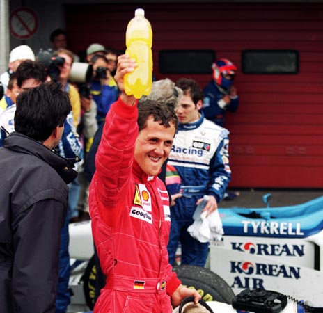 Ferrari driver Michael Schumacher celebrates after the European GP at the Nurburgring, in Nurburg, Germany on April 28, 1996