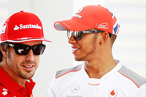 Fernando Alonso with Lewis Hamilton