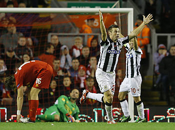 Udinese's Giovanni Pasquale (2nd from right) celebrates scoring against Liverpool during their Europa League match on Thursday