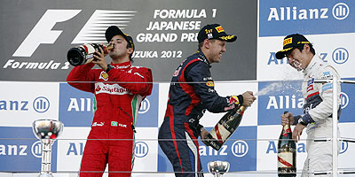 Ferrari's Felipe Massa (left), Red Bull's Sebastian Vettel (centre) and Sauber's Kamui Kobayashi on the podium on Sunday