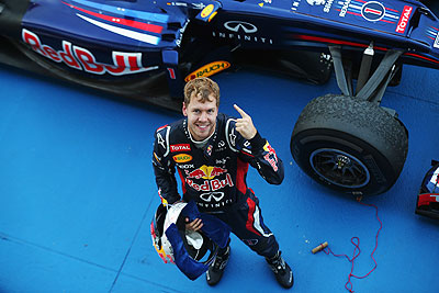 Red Bull's Sebastian Vettel celebrates in parc ferme after winning the Japanese Formula One Grand Prix on Sunday