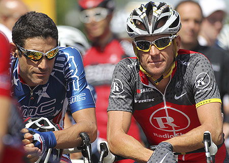 Lance Armstrong (right) is pictured with former teammate George Hincapie