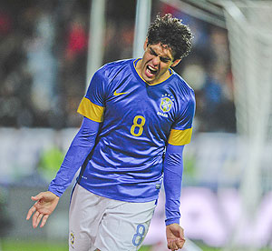 Brazil's Kaka celebrates scoring his team's third goal against Iraq on Thursday