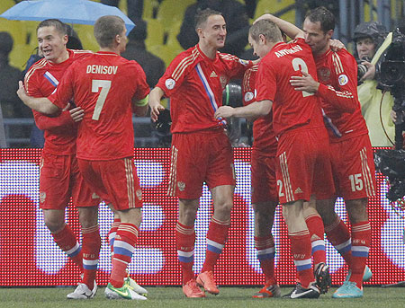 Russia's players celebrate after scoring against Portugal