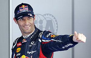 Red Bull Formula One driver Mark Webber celebrates taking pole position after the qualifying session of the South Korean Grand Prix at the Korea International Circuit in Yeongam on Saturday