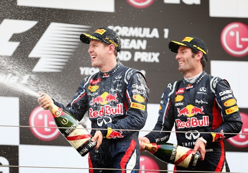 Race winner Sebastian Vettel (left) of Red Bull Racing celebrates   with second placed teammate Mark Webber