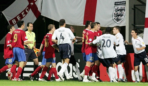 England and Serbia players during a scuffle
