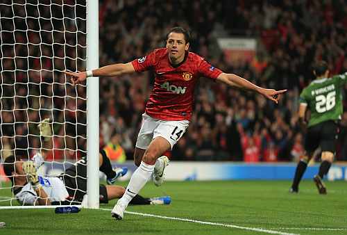Javier Hernandez of Manchester United celebrates scoring his team's third goal to make the score 3-2 during the UEFA Champions League Group H match between Manchester United and SC Braga