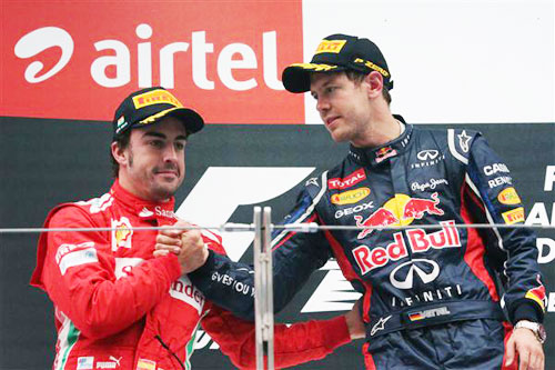 Sebastian Vettel with Fernando Alonso (left)