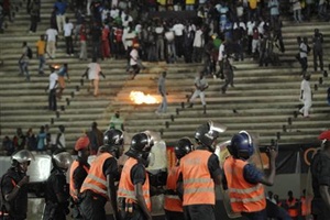 Senegalese fans throw rocks at the police