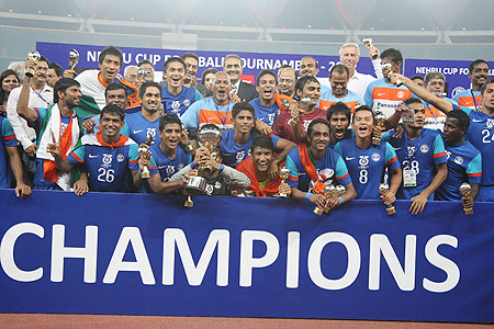 Indian players celebrate after winning the Nehru Cup on Sunday