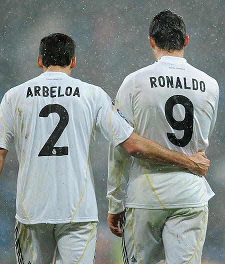 Real Madrid'S Alvaro Arbeloa with teammate Cristiano Ronaldo