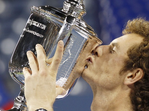 Britain's Andy Murray kisses his trophy