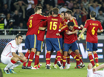 Spain's players celebrate a goal during their 2014 World Cup qualifier against Georgia at Boris Paichadze Stadium in Tbilisi on Tuesday