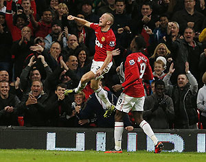 Manchester United's Tom Cleverley (left) celebrates after scoring against Newcastle United  during their League Cup match on Wednesday