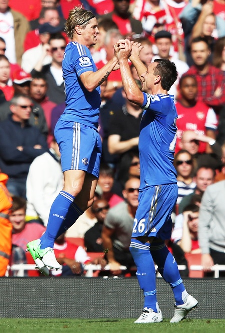 Chelsea's Fernando Torres celebrates scoring the first goal of the match with   teammate John Terry