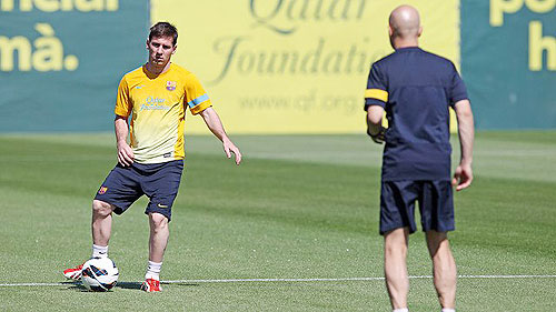 Lionel Messi goes through the grind at a training camp on Thursday