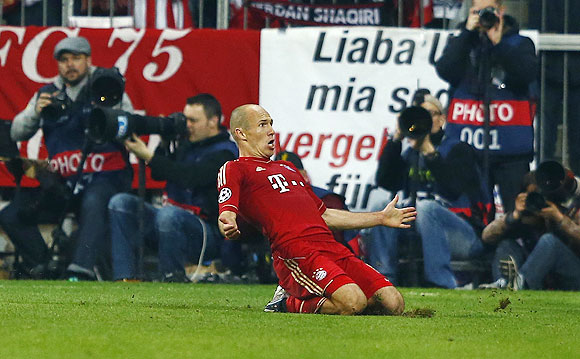Arjen Robben celebrates after scoring against Barcelona