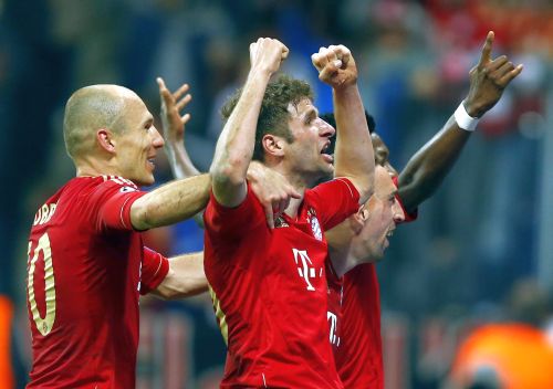 Bayern Munic players celebrate after scoring a goal