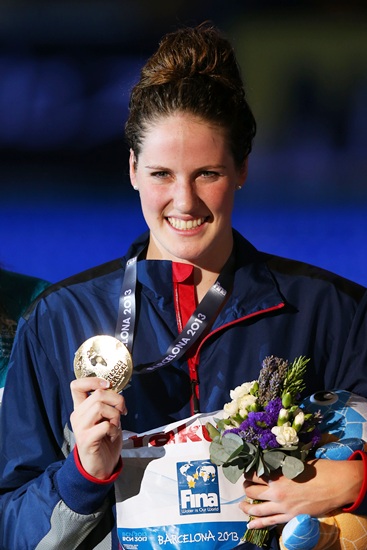 Gold medal winner Missy Franklin of the USA celebrates on the podium