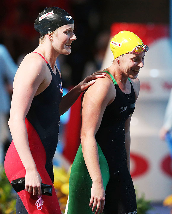 Missy Franklin (left) of the USA celebrates with Alicia Coutts of Australia after the women's Freestyle   4x200m Final of the World Championships at Palau Sant Jordi