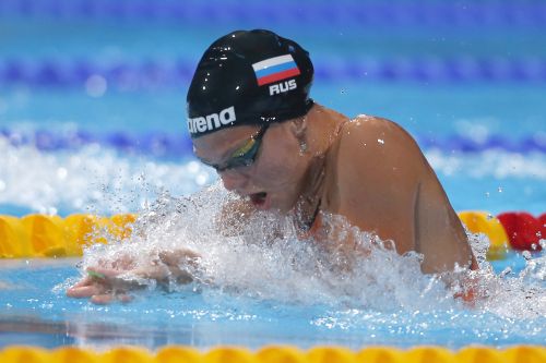 Yuliya Efimova of Russia competes to set a world record in the women's 50m breaststroke heats during the World Swimming Championships at the Sant Jordi arena in Barcelona