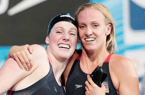 Missy Franklin of the USA celebrates with teammate Dana Vollmer after the Swimming Women's Medley 4x100m Relay final in Barcelona on Sunday